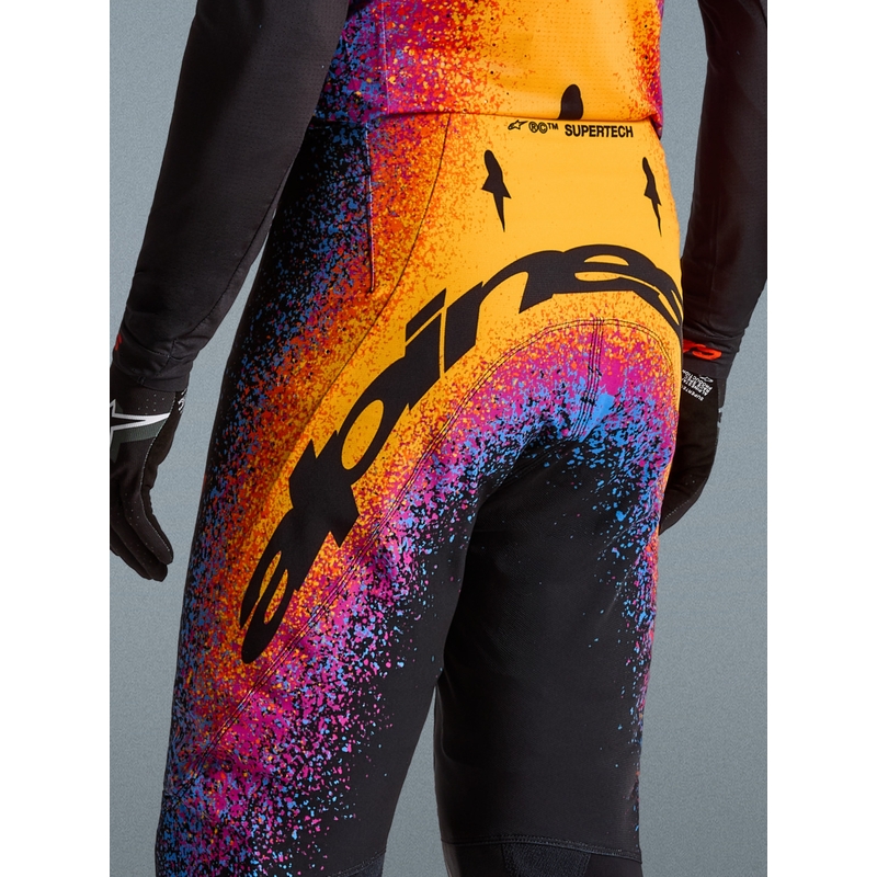 Motokrosové kalhoty Alpinestars Supertech limitovaná edice Black Hole černo-barevné