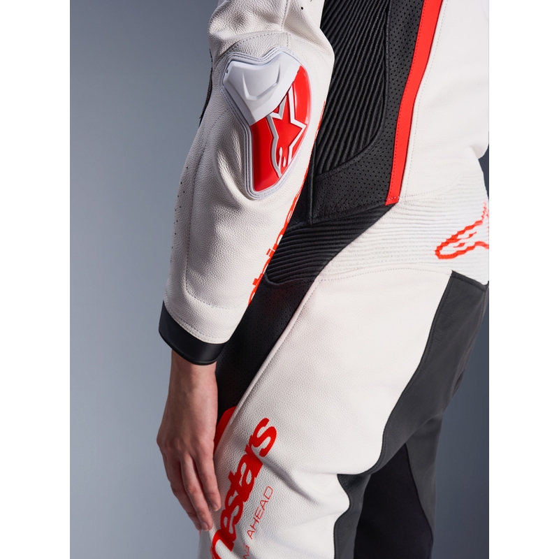 Dámská jednodílná kožená kombinéza na motorku Alpinestars Stella GP-R7 bílo-fluo červeno-černá
